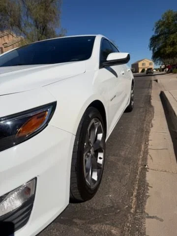 Alloy wheel on a white sedan